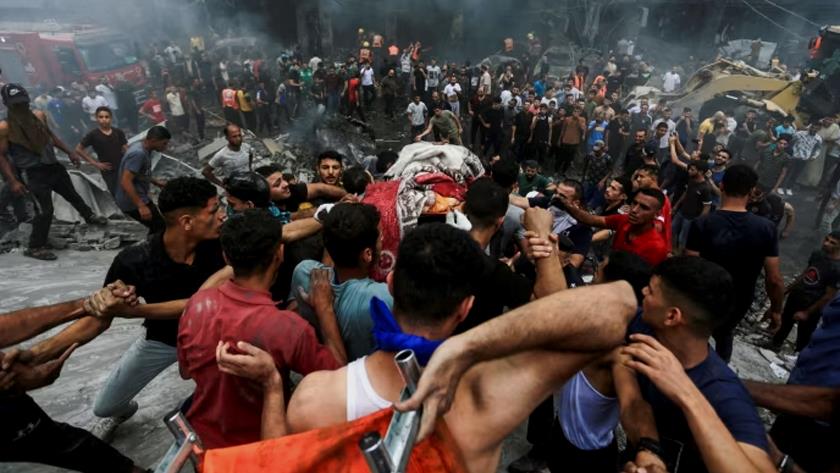 Iranpress: Number of Palestinian martyrs in Zionists attacks reaches to 1200