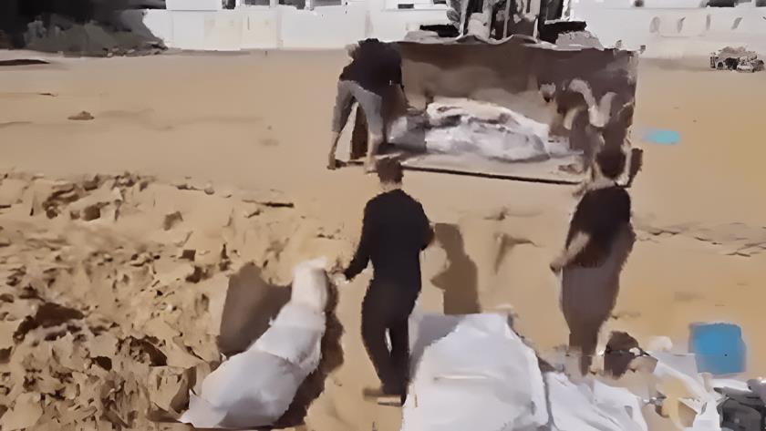 Iranpress: Video: Indonesian hospital transforms into mass grave in Gaza