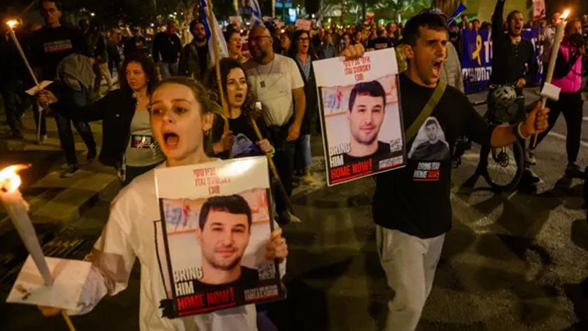 Iranpress: Protests erupts in Tel Aviv after military admits killing of three captives in Gaza