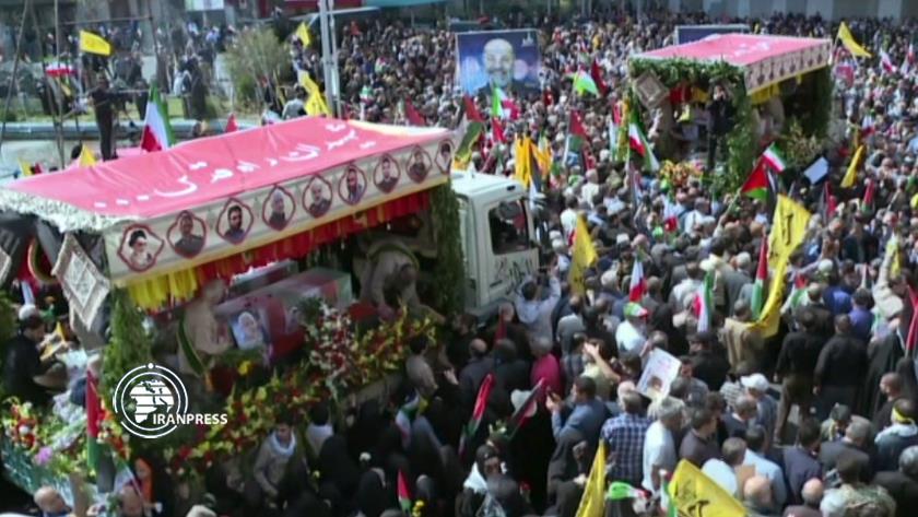 Iranpress: On Quds Day, Iranian nations bids farewell to Seven martyred military advisors 