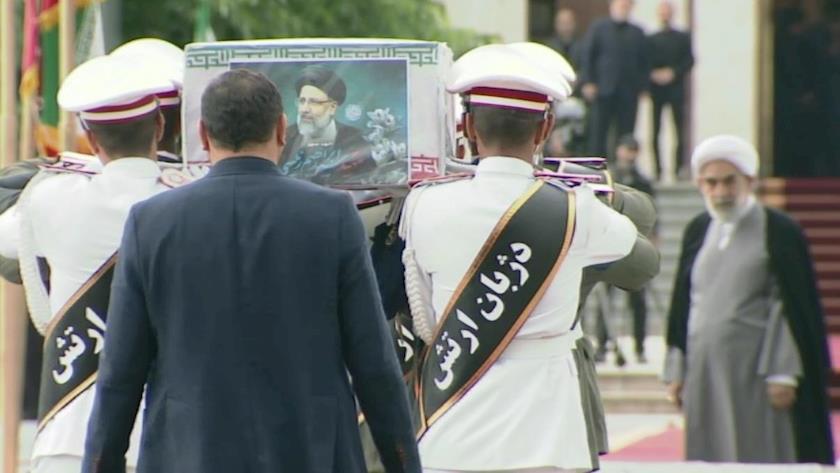 Iranpress: Plane carrying bodies of martyred President and his companions arrive in Tehran