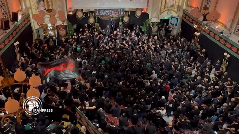 Iranpress: People Hold Mourning Rituals of Ashura Night in UK