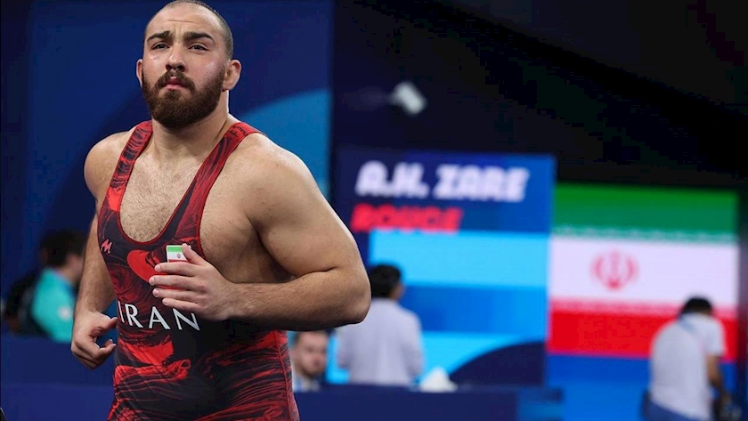 Iranpress: Iranian 125 kg Wrestler Wins Olympic Silver Medal