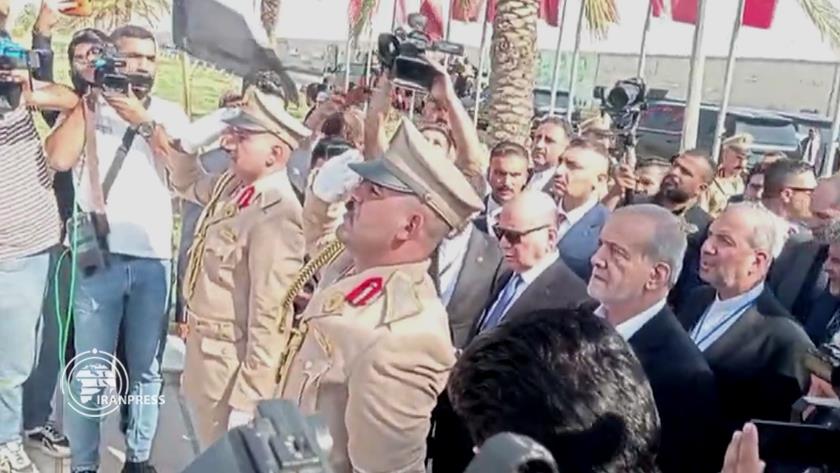 Iranpress: Iranian President Pays Tribute to Resistance Martyrs Upon Arrival in Iraq