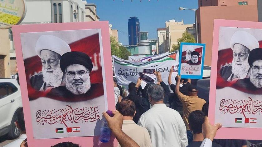 Iranpress: Supporters of Palestine and Lebanon in Bahrain March in Solidarity