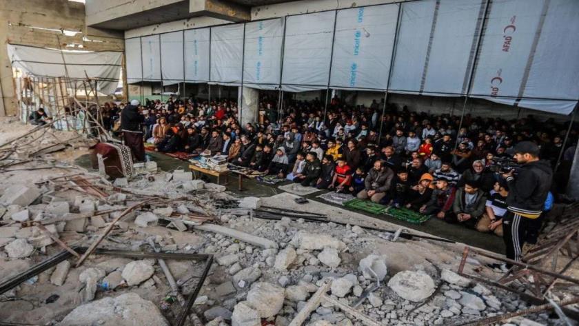 Iranpress: Gazans Mark Eid al-Fitr Prayers on the Ruins of Mosques Amid Israeli Bombardment 