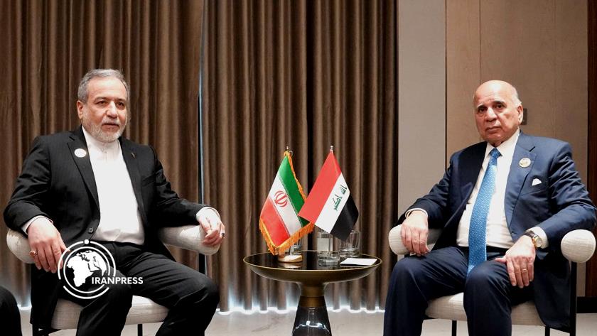 Iranpress: Iran-Iraq FMs meet in Baghdad To Discuss Bilateral, Regional Issues