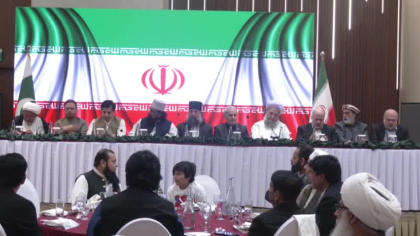 Iranpress: Iranian Embassy in Islamabad hosts Quds Day Seminar  